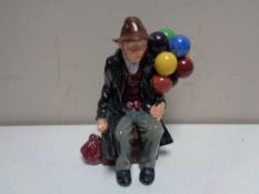A Royal Doulton figure - The Balloon Man HN 1954