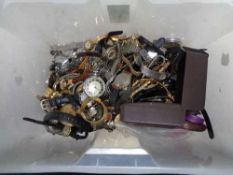 A box of lady's and gent's wrist watches,