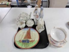 A tray of Spanish figures, Royal Doulton plate depicting boats,