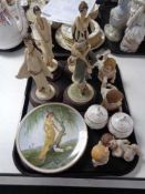 A tray of four Art Deco Italian figures on wooden stands, two wall plates,