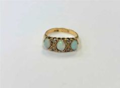 An antique 18ct gold opal and diamond ring,