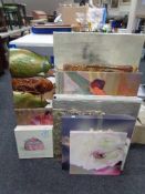A large quantity of assorted prints, wall canvases,