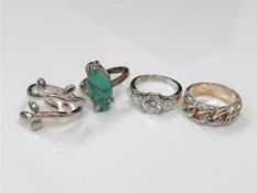 Four sterling silver dress rings (4)