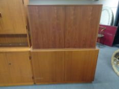 Two mid century Danish teak double door cabinets