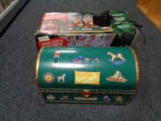A boxed Mr Christmas Santas Musical Toy Chest