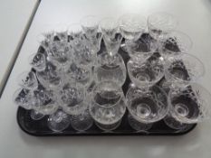 A tray of glass, crystal,