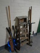 A set of folding wooden steps,