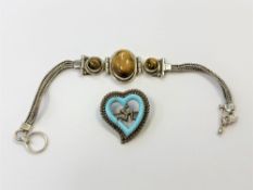 A silver and tiger's eye bracelet,