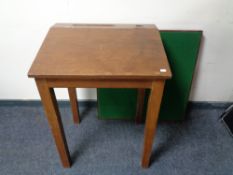 A mid century school desk together with a card table