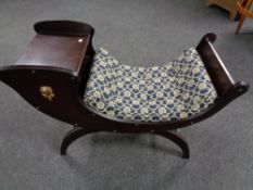 A reproduction mahogany telephone table