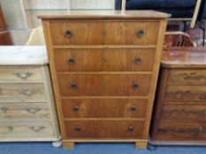 A twentieth century five drawer chest