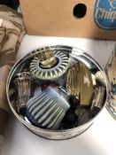 A tin of assorted table and pocket lighters to include Zippo,