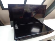 A Philips 40 inch LCD TV on stand together with a Samsung 32 inch LCD TV (no stand) with remotes no