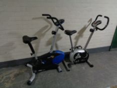 A Proteus exercise bike together with one other