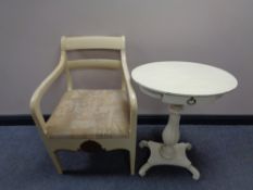 A nineteenth century painted pedestal occasional table together with a painted armchair