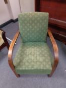 A 1930's beech framed armchair