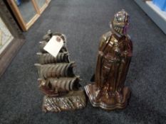 An early twentieth century cast iron lustre ship companion set and knight companion set