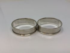 A pair of oval silver napkin rings,