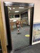 A black framed mirror