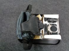 A tray of boxed Canon Eos 50E camera with lens together with a camera bag containing Canon EA-1