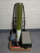 A box of fishing box, roll of garden mesh,