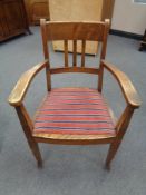 An early twentieth century oak armchair