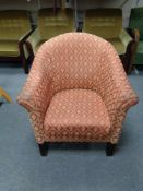 A tub chair in classical print