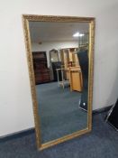 A gilt framed overmantel mirror,