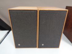 A pair of teak cased Bang and Olufsen Beovox 220 speakers