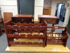 A pair of Regency style flap sided sofa occasional tables with magazine rack and wine rack