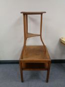 An Eastern triangular table together with two tier oak table