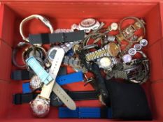 A box of replica and costume lady's and gent's wristwatches