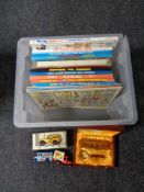 A box of Beano and Dandy annuals, die cast vehicles,