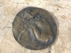 A bronzed plaque, nude study,