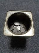 A vintage tin of one shilling and two shilling pieces