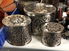 A set of three Indian white metal graduated lidded caddies