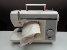 A Toyota electric sewing machine (no foot pedal)