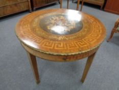 A late 19th century French circular walnut, satinwood and floral marquetry occasional table,