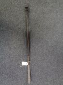 A nineteenth century parasol with embossed metal handle depicting animals