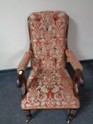 A Victorian scroll armchair upholstered in classical fabric