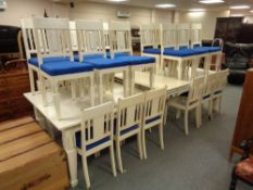 A twentieth century painted dining table, length with five leaves 452 cm,