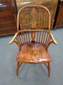 An elm Windsor style armchair
