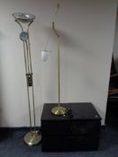 A pair of Ikea two drawer bedside chests together with two brass floor lamps