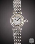 A LADIES 18K SOLID WHITE GOLD, DIAMOND & SAPPHIRE TABBAH BERET BRACELET WATCH CIRCA 1990s