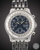 A GENTLEMAN'S STAINLESS STEEL BREITLING MONTBRILLIANT OLYMPUS NAVITIMER TRIPLE CALENDAR MOONPHASE