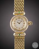 A LADIES 18K SOLID GOLD, DIAMOND & EMERALD TABBAH BERET BRACELET WATCH CIRCA 1990s, WITH ORIGINAL
