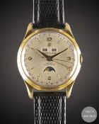 A GENTLEMAN'S GOLD PLATED BREITLING DATORA AUTOMATIC TRIPLE CALENDAR MOONPHASE WRIST WATCH CIRCA
