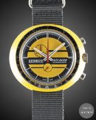A GENTLEMAN'S RESIN CASED LEONIDAS EASY RIDER CHRONOGRAPH WRIST WATCH CIRCA 1970s, WITH YELLOW