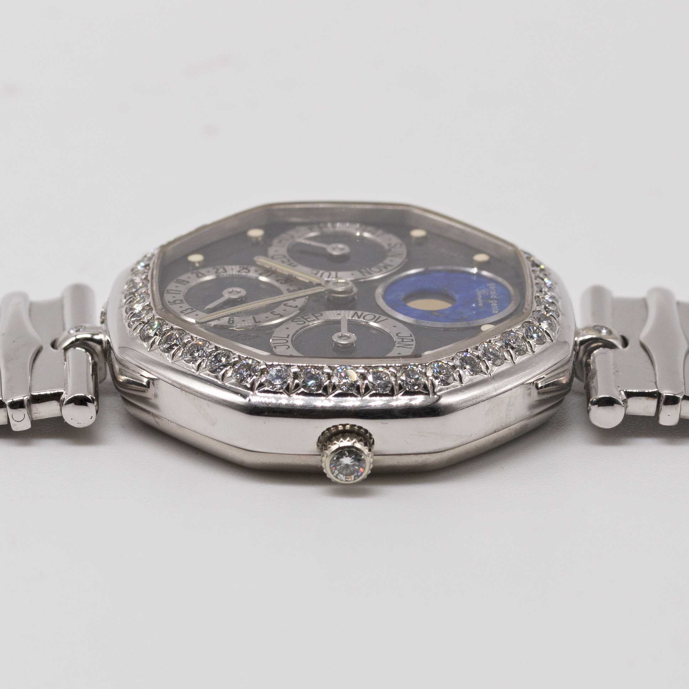 AN 18K SOLID WHITE GOLD & DIAMOND GERALD GENTA TRIPLE CALENDAR MOONPHASE BRACELET WATCH CIRCA - Image 9 of 10