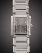 A LADIES STAINLESS STEEL & DIAMOND PATEK PHILIPPE TWENTY-4 BRACELET WATCH DATED 2006, REF. 4910/